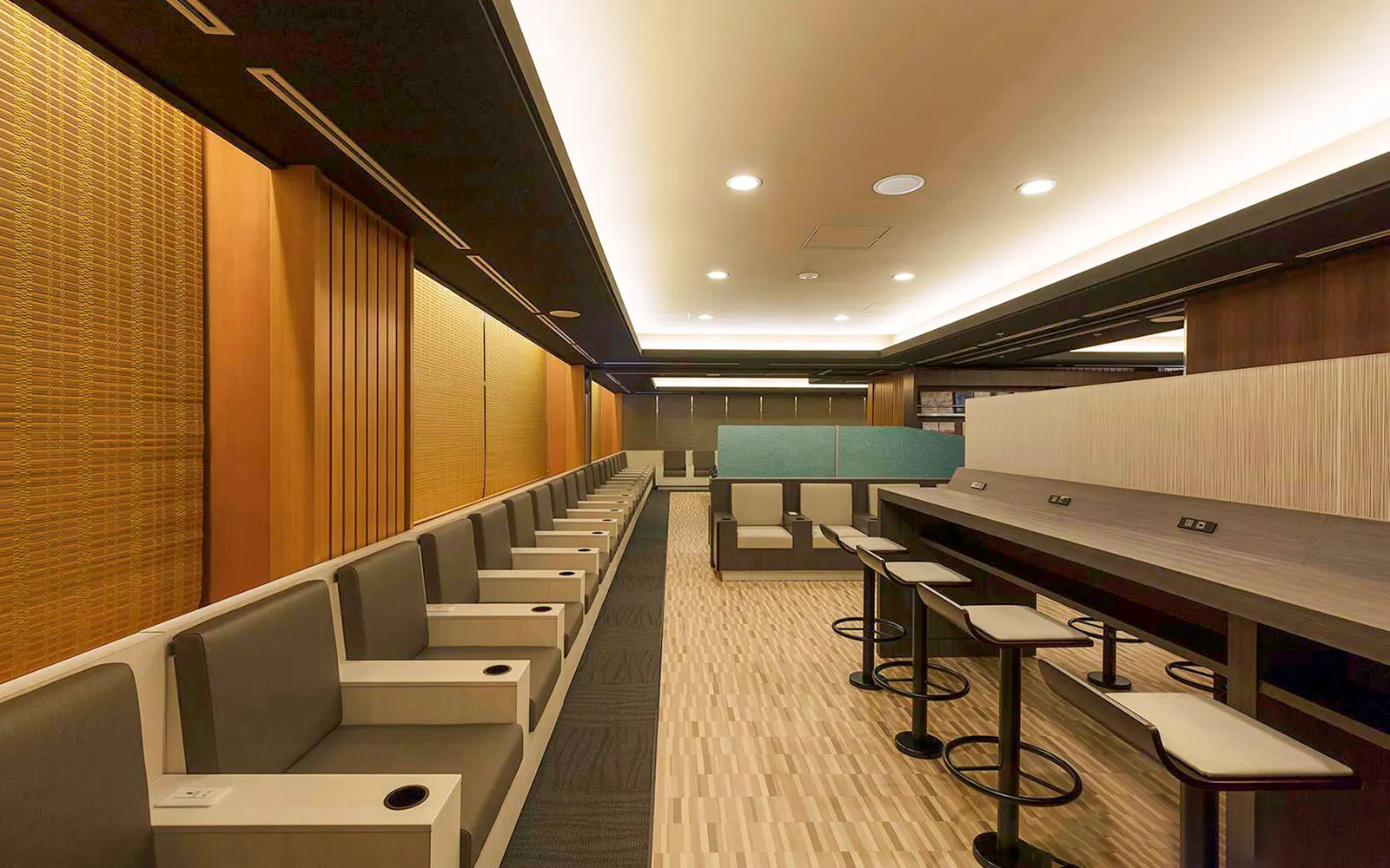 Waiting area seating at Narita International Airport Terminal 1 lounge.