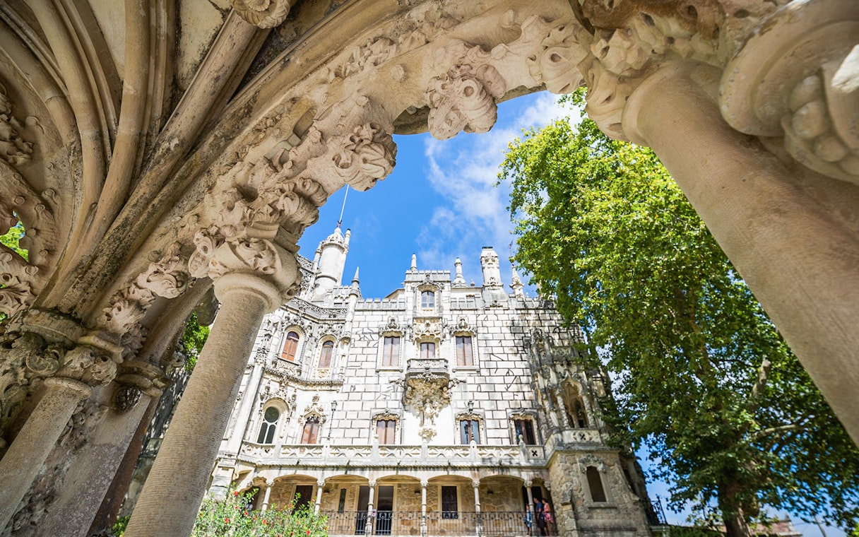 Quinta da Regaleira's ornate architecture and lush gardens in Sintra, Portugal.