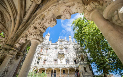 Quinta da Regaleira's ornate architecture and lush gardens in Sintra, Portugal.