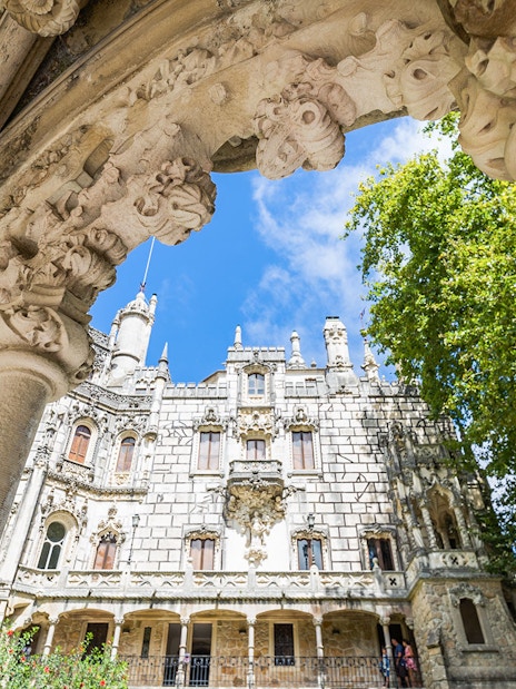 Quinta da Regaleira's ornate architecture and lush gardens in Sintra, Portugal.