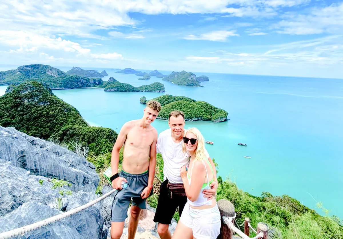 Tourists enjoying the view of Ang Thong Marine Park islands from a viewpoint in Koh Samui.