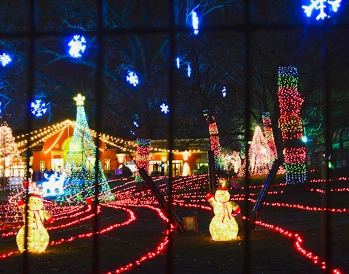 Lincoln Park ZooLights display with illuminated snowmen and trees in Chicago during Christmas.