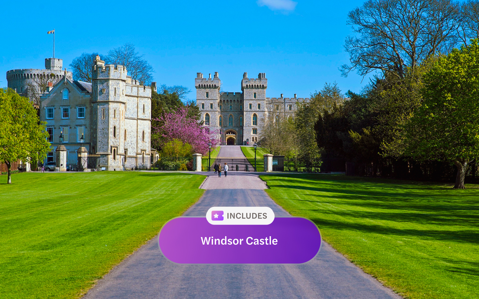 Windsor Castle entrance with pathway and surrounding gardens.