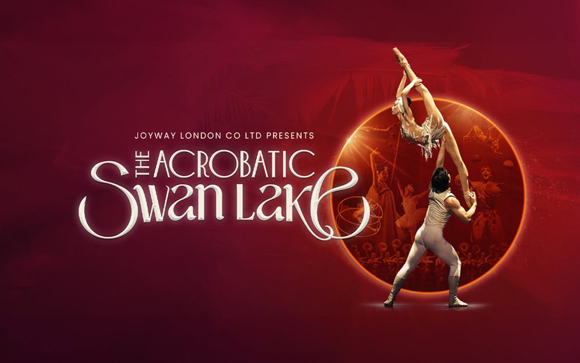 Acrobats performing Swan Lake with dramatic lift against a red backdrop.