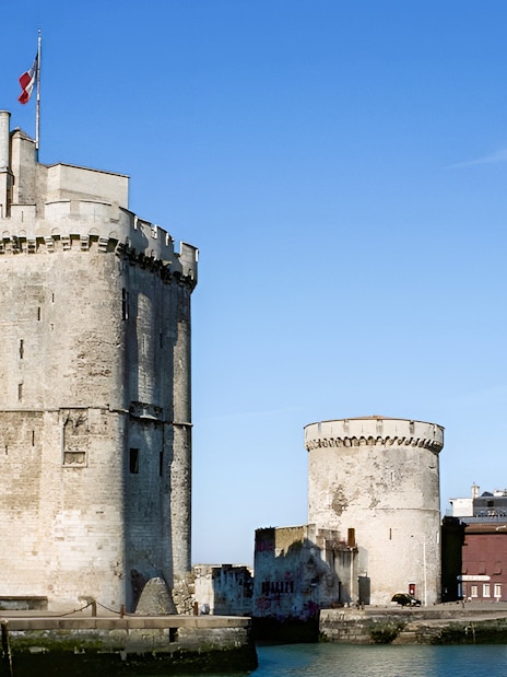 Towers of La Rochelle overlooking the harbor in Loire Valley, France.
