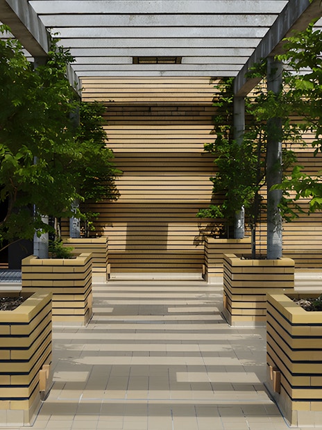 Villa Cavrois entrance with modern architecture and lined planters, France.