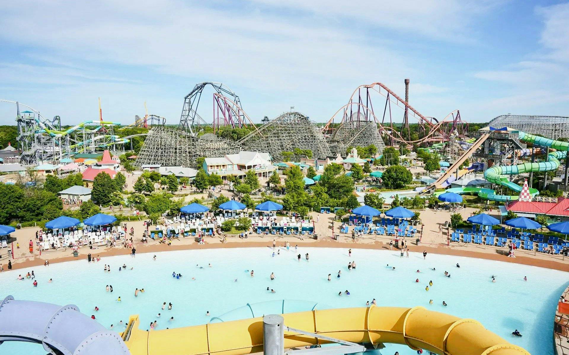 Water park with wave pool and slides at Hurricane Harbor Chicago.