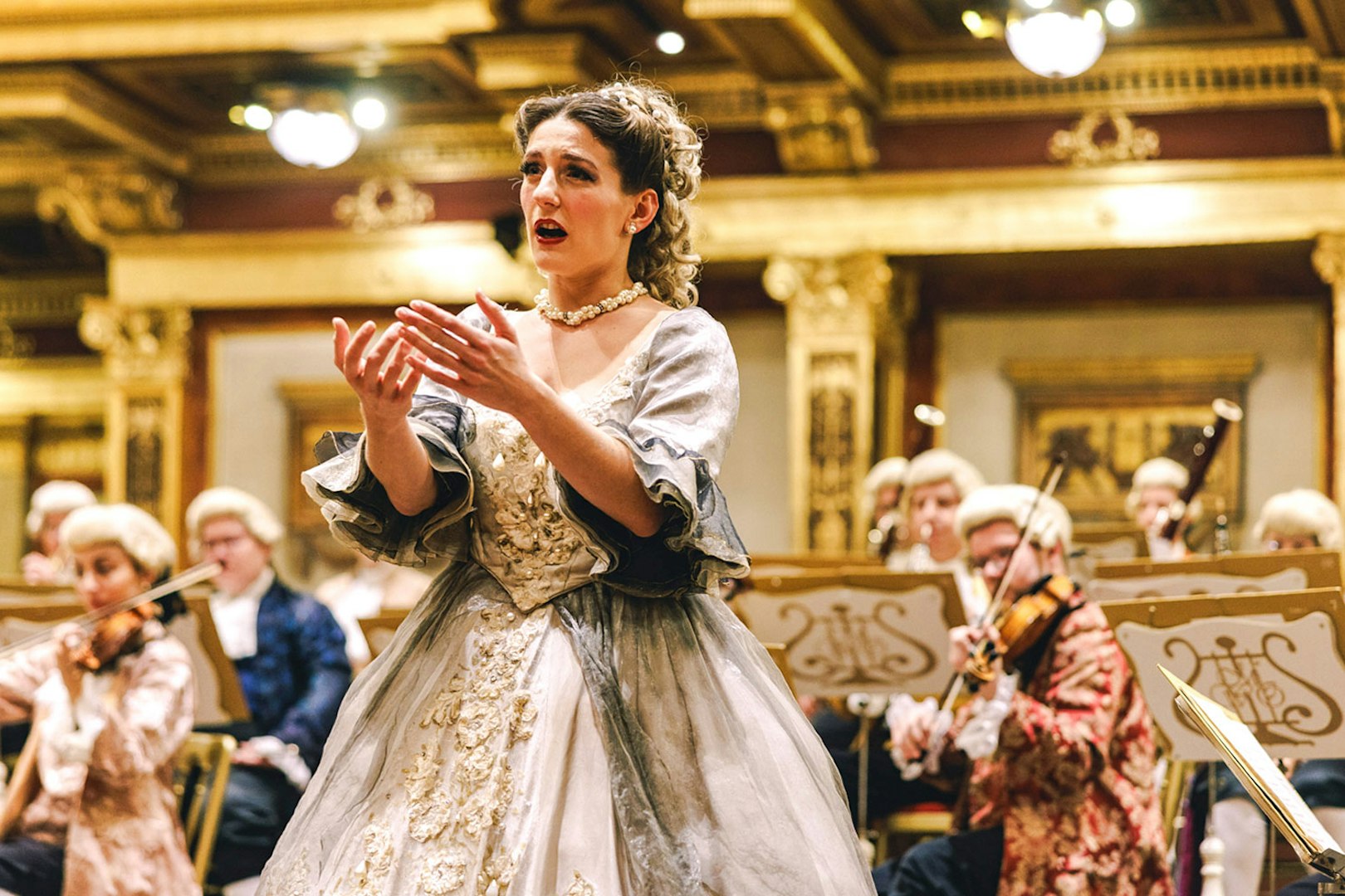 Mozart Orchestra performing in Vienna's Golden Hall at Musikverein.