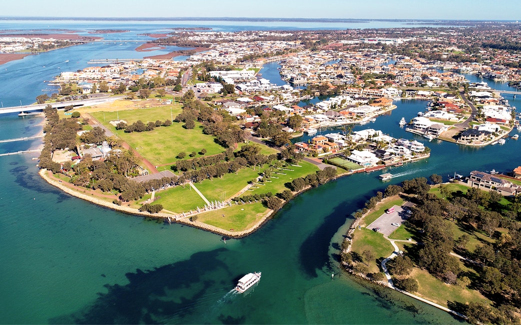 Aerial view of Mandurah's waterways and residential areas in Western Australia.