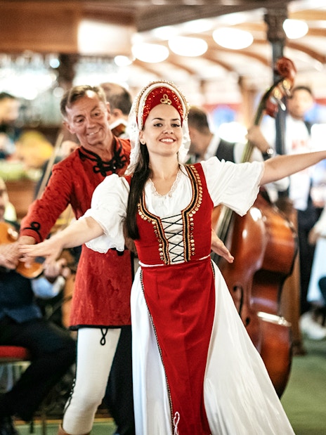 Guests enjoying traditional dance performance on New Year’s Eve Cruise in Budapest.