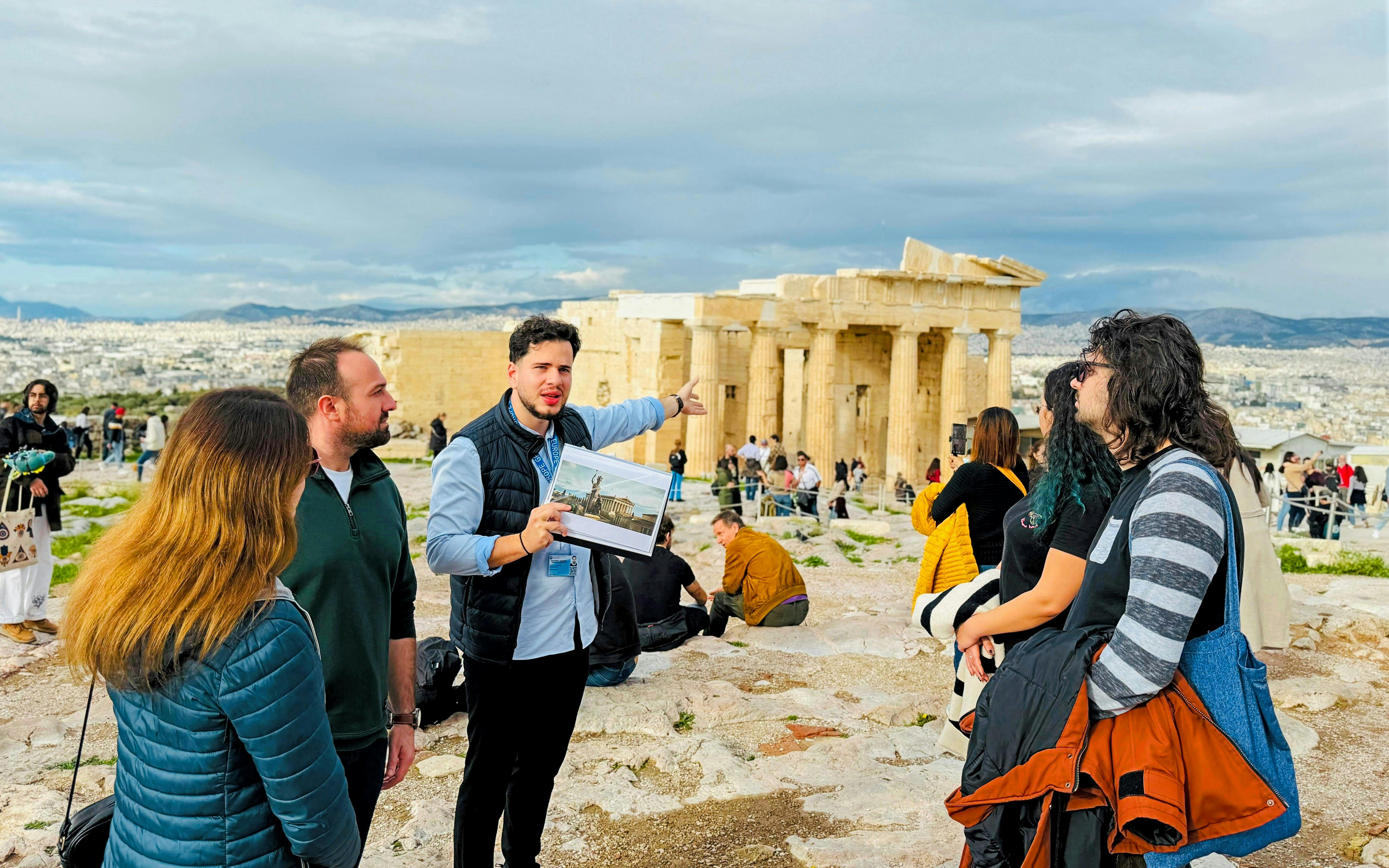 Small group tour at the Parthenon, guide explaining Acropolis history in Athens.