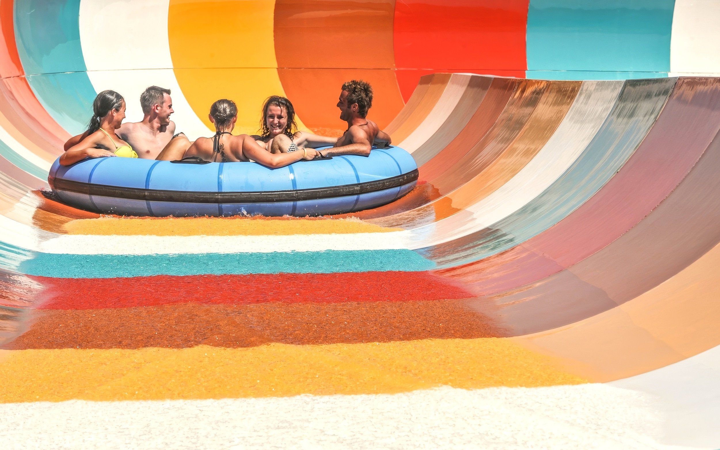 People enjoying a water bowl ride at Makadi Water World, Hurghada.