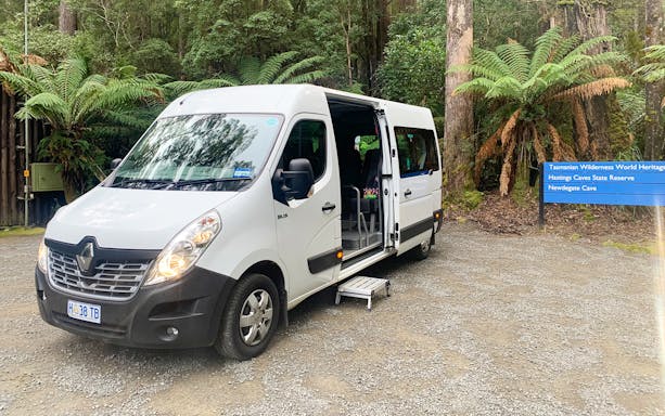Tour van at Hastings Caves State Reserve entrance, Tasmania.