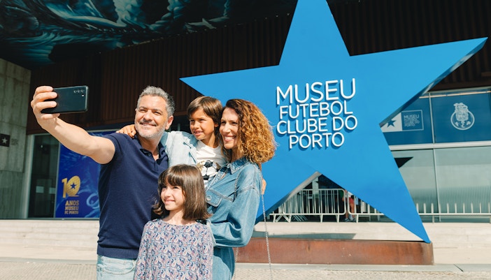 Visitors outside FC Porto Stadium Museum in Porto, Portugal, gathering near the entrance.