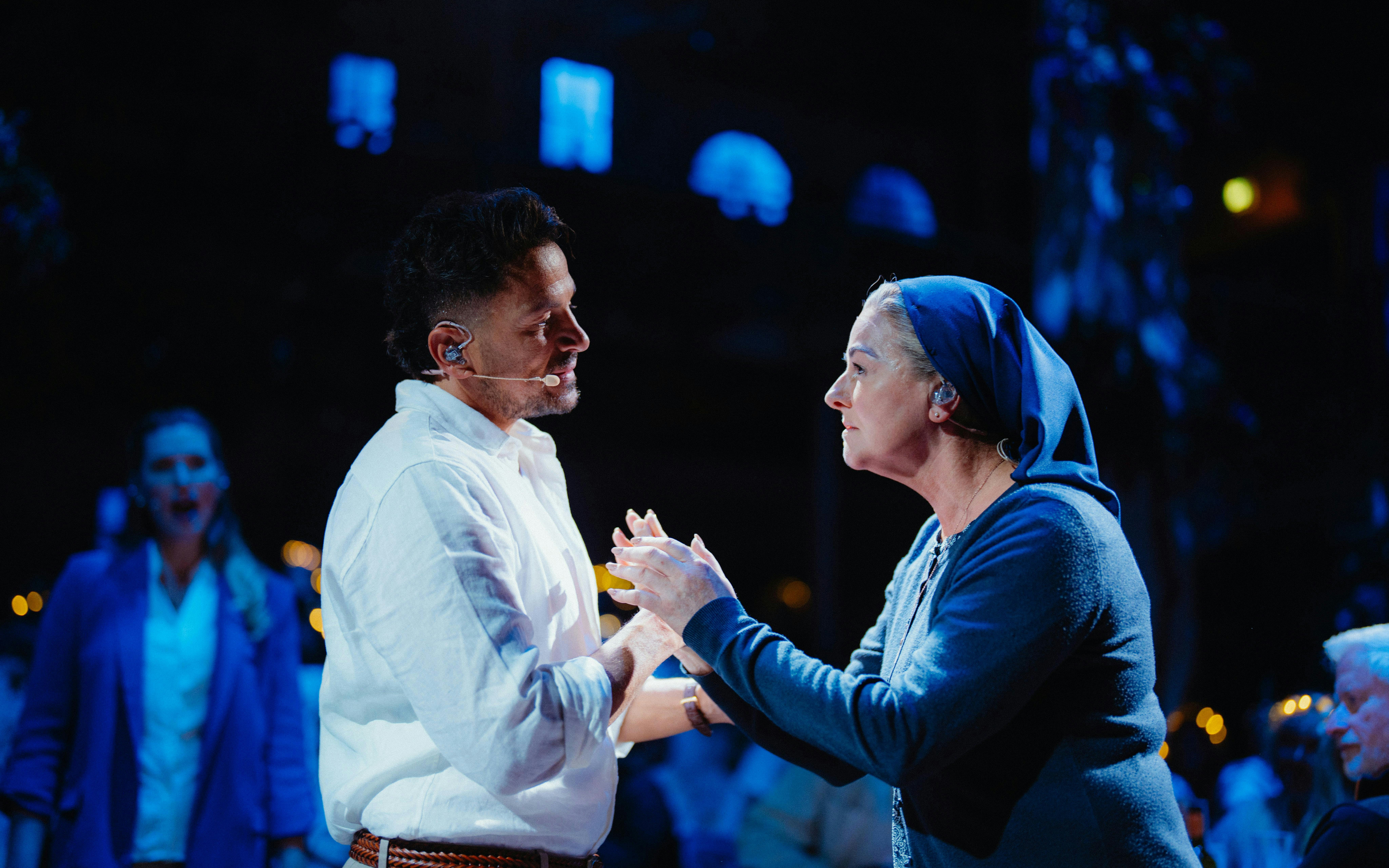 Actors performing a scene in Mamma Mia! The Party.