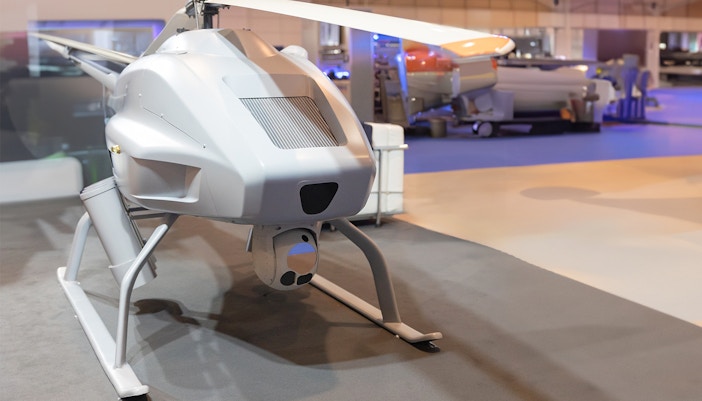 White big drone copter on exhibit.