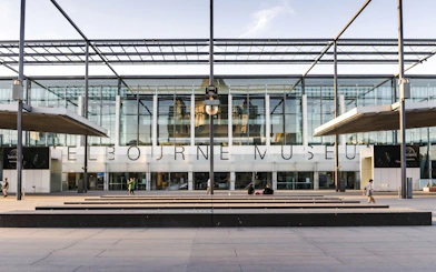 Melbourne Museum entrance with glass facade, located in Victoria.