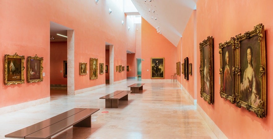 Thyssen Bornemisza Museum gallery room displaying classic paintings in Madrid.