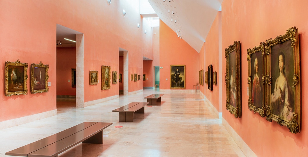Thyssen Bornemisza Museum gallery room displaying classic paintings in Madrid.