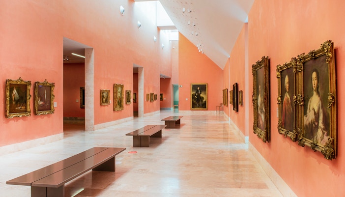 Thyssen Bornemisza Museum gallery room displaying classic paintings in Madrid.