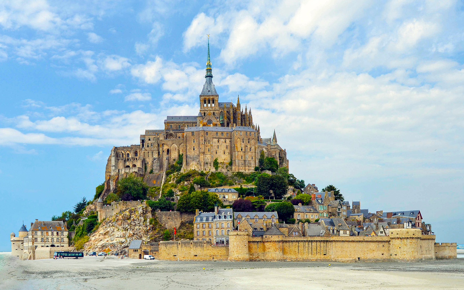 Mont Saint-Michel island with abbey and surrounding village, France.