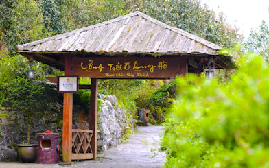 O Quy Ho Heaven Gate entrance surrounded by lush greenery in Sa Pa.