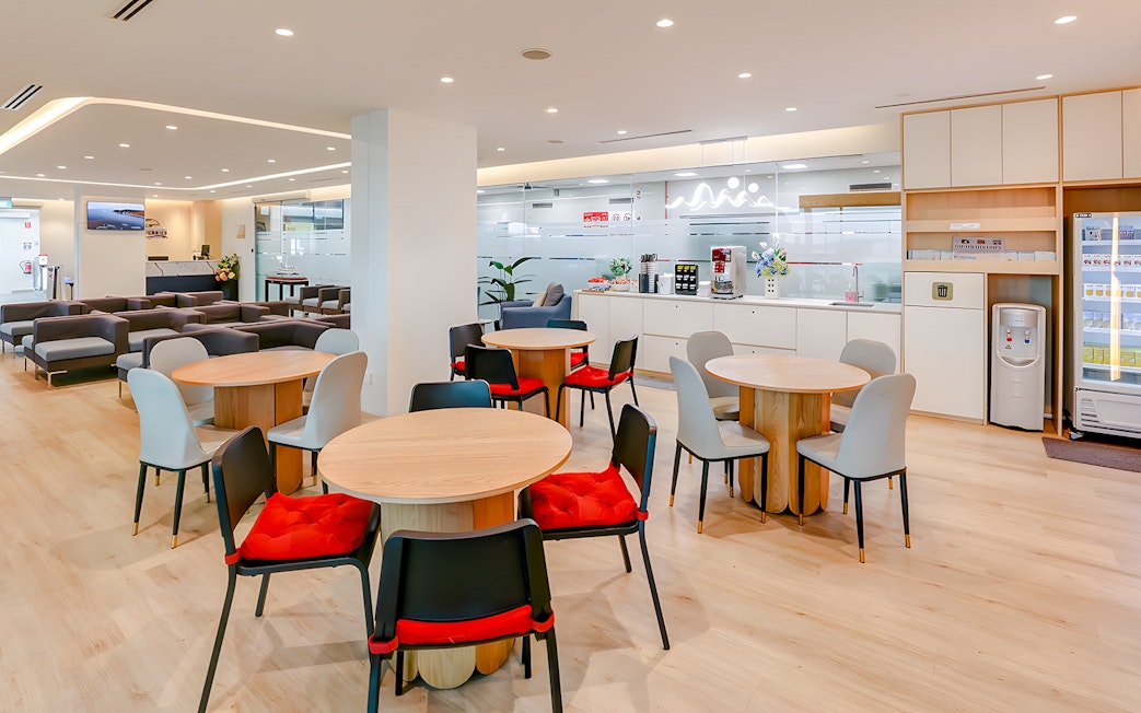 Ferry lounge interior with seating and café area on Singapore to Bintan Resorts route.