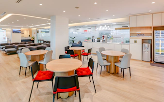 Ferry lounge interior with seating and café area on Singapore to Bintan Resorts route.