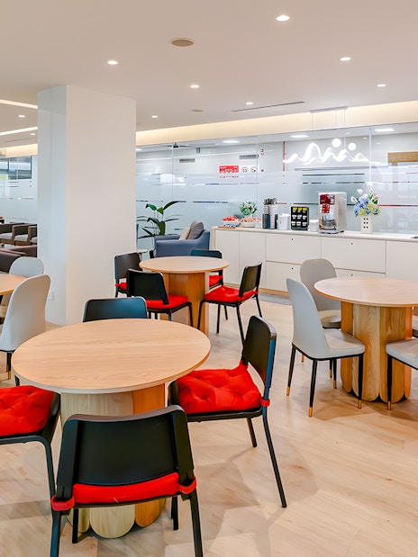 Ferry lounge interior with seating and café area on Singapore to Bintan Resorts route.