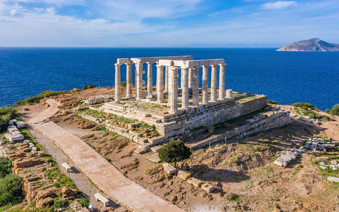 Temple of Poseidon at Cape Sounion overlooking the Aegean Sea.