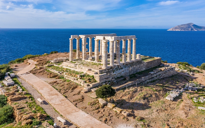 Temple of Poseidon at Cape Sounion overlooking the Aegean Sea.