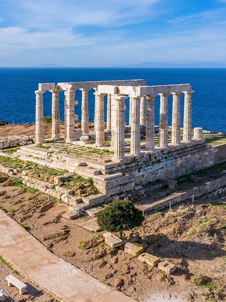 Temple of Poseidon at Cape Sounion overlooking the Aegean Sea.