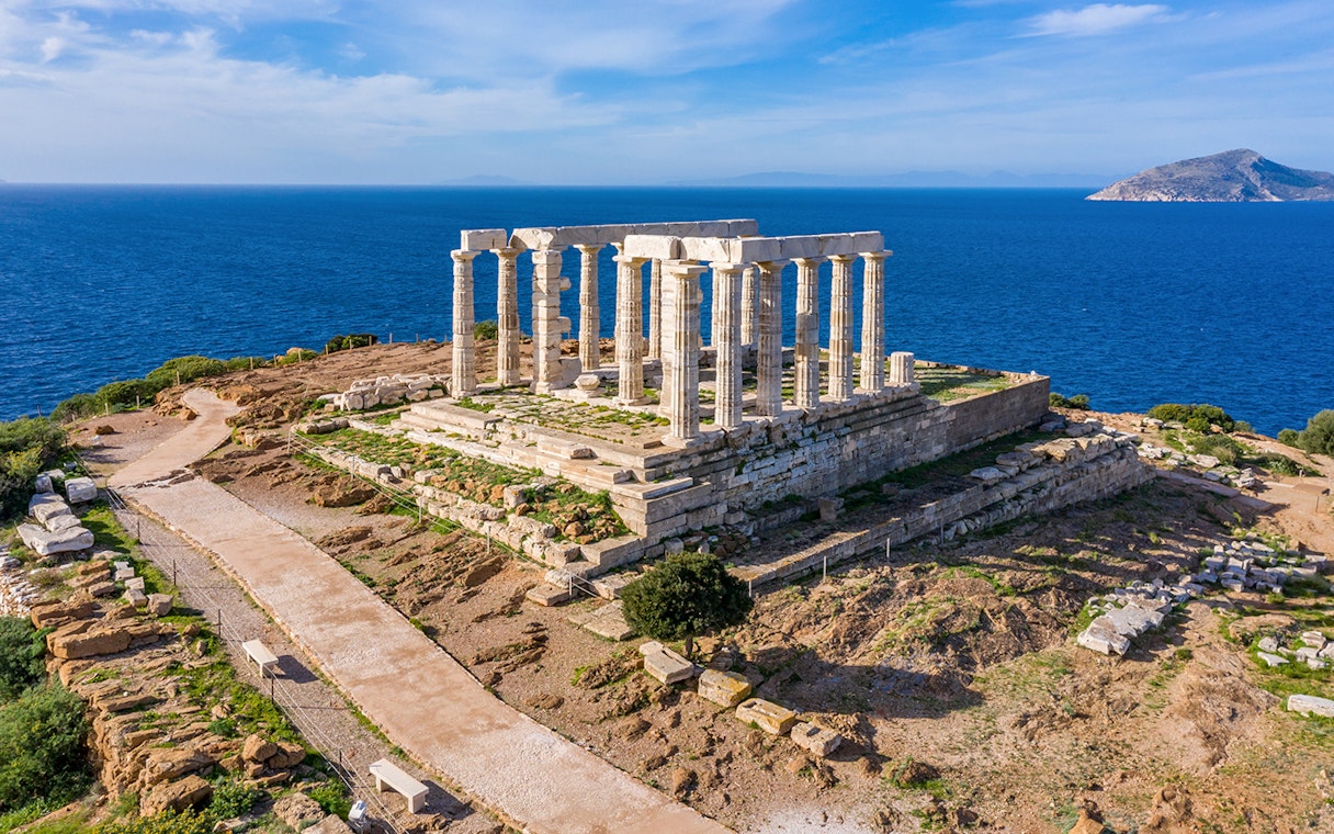 Temple of Poseidon at Cape Sounion overlooking the Aegean Sea.