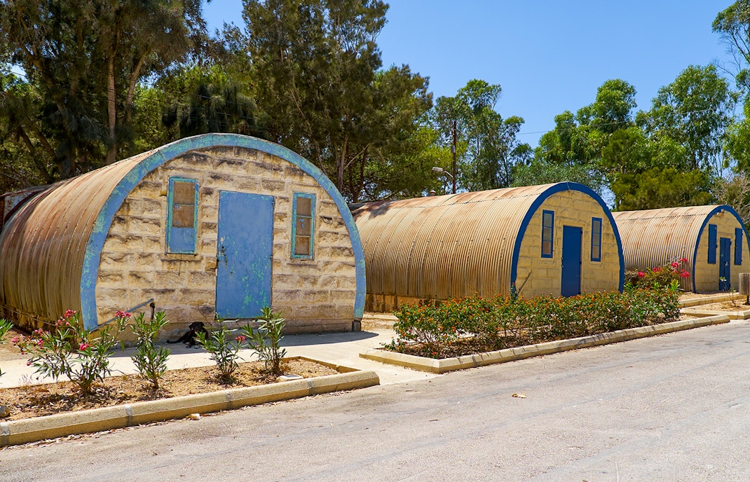 Artisan crafting glassware at Ta' Qali Crafts Village, Attard, Malta.