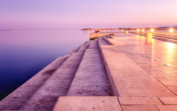 Sea organ steps at sunset in Zadar, Croatia, overlooking the Adriatic Sea.