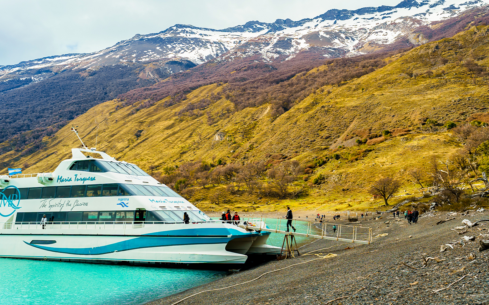 Tourists boarding a boat on Lake Argentino for Perito Moreno, Spegazzini, and Upsala exploration.