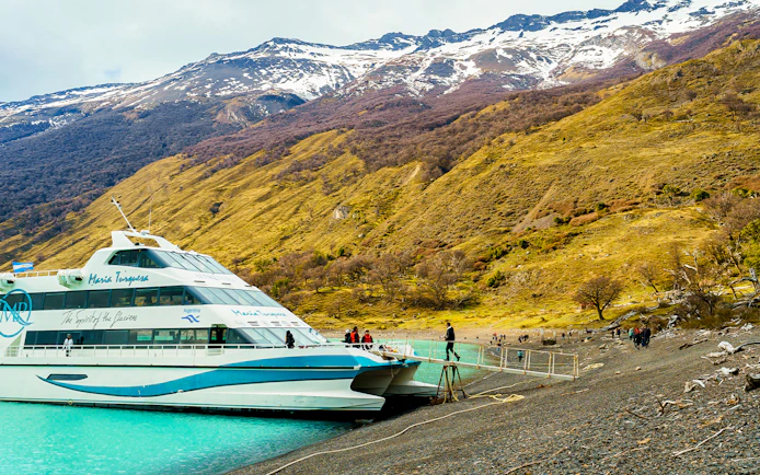 Tourists boarding a boat on Lake Argentino for Perito Moreno, Spegazzini, and Upsala exploration.
