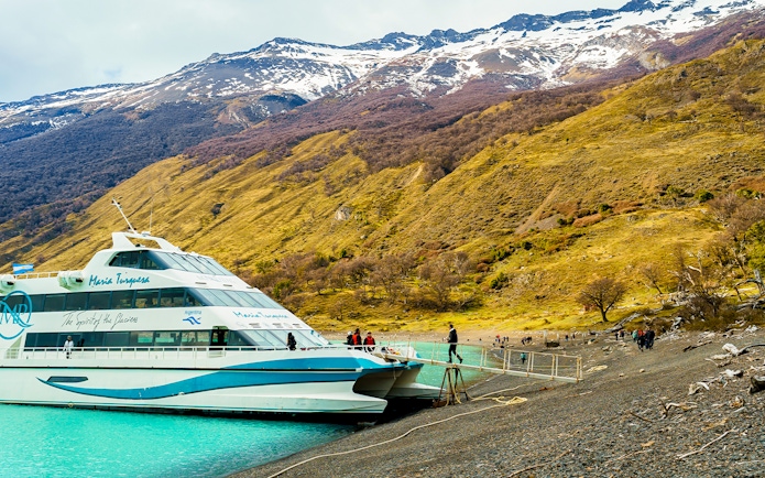 Tourists boarding a boat on Lake Argentino for Perito Moreno, Spegazzini, and Upsala exploration.