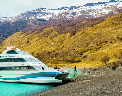 Tourists boarding a boat on Lake Argentino for Perito Moreno, Spegazzini, and Upsala exploration.