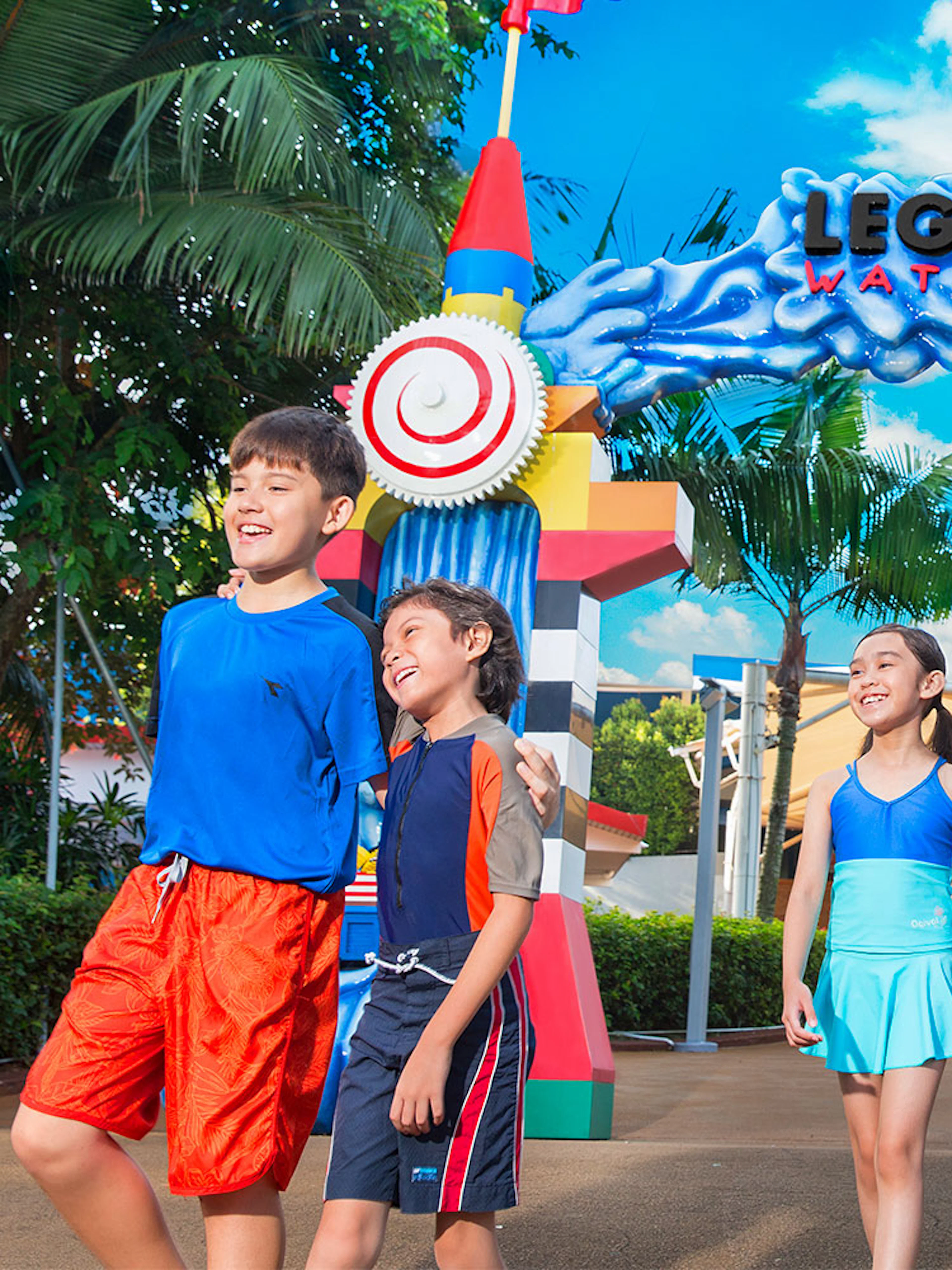Children entering LEGO-themed entrance at LEGOLAND Malaysia Water Park.