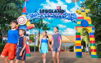 Children entering LEGO-themed entrance at LEGOLAND Malaysia Water Park.