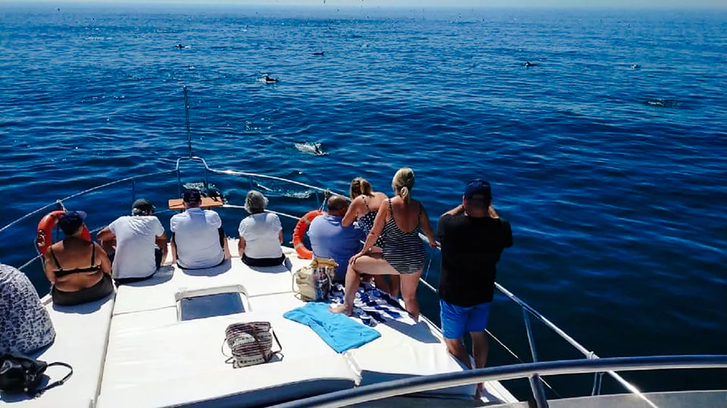 Tourists enjoying a boat trip on the ocean near Agadir.