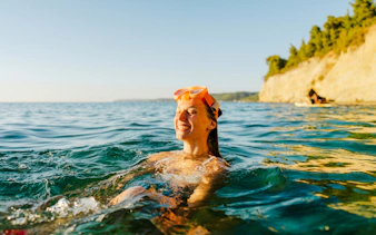 Swimmer enjoying the Bosphorus waters during an Istanbul group cruise.