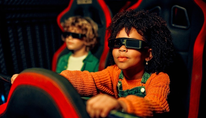 Children wearing 3D glasses at Zoomarine Algarve 4D Cinema experience.