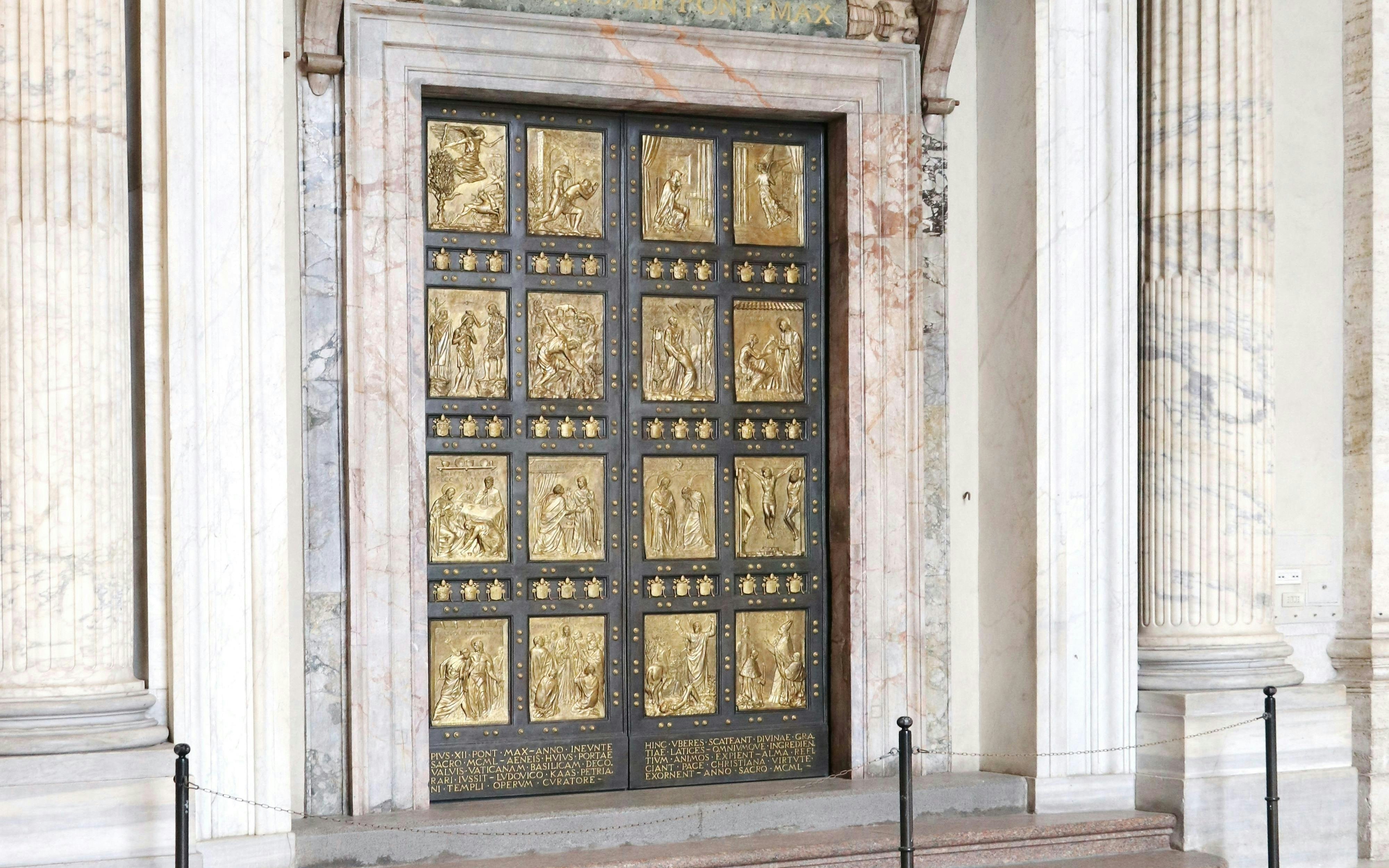 Holy Door with bronze panels at St. Peter's Basilica, Rome.