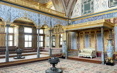 Topkapi Palace Harem interior with ornate decor and seating area, Istanbul.