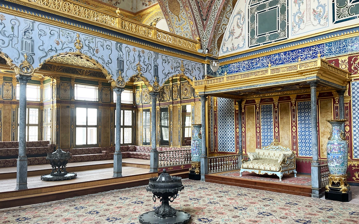Topkapi Palace Harem interior with ornate decor and seating area, Istanbul.