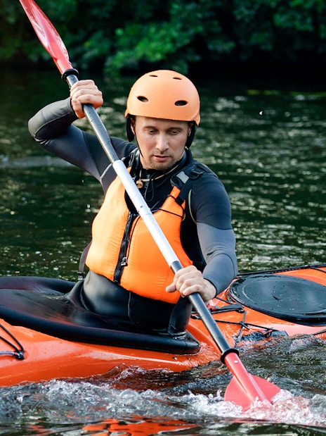 Kayaker paddling in Blue Eye, Albania.
