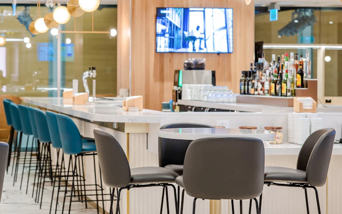 Bar seating area at Plaza Premium Lounge, Vancouver International Airport (YVR).