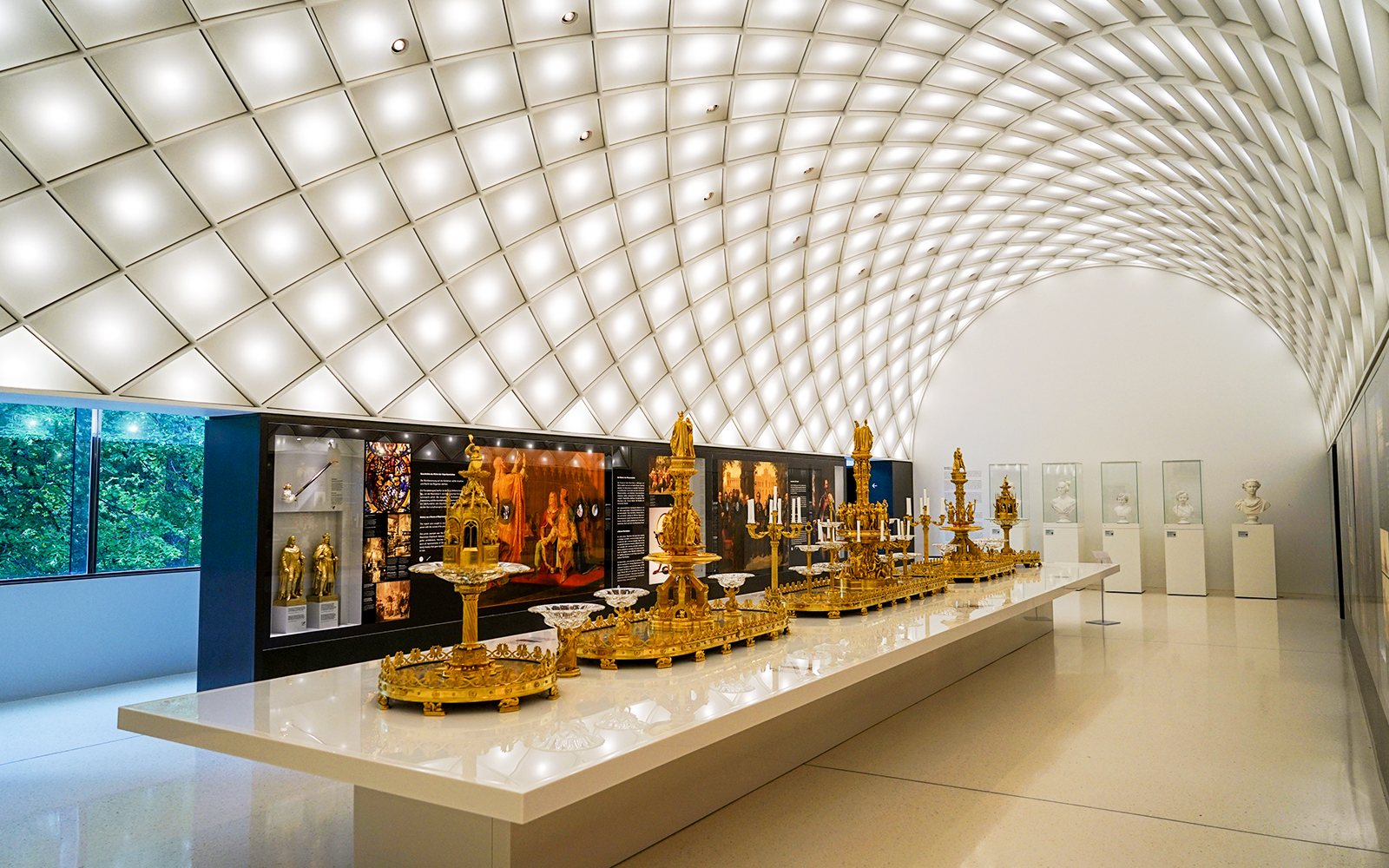 Golden artifacts displayed in the Museum of the Bavarian Kings exhibition hall.